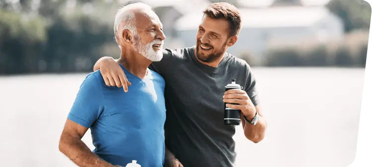 A confident mature man smiling outdoors